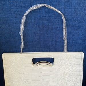White alligator clutch or shoulder purse.  crocodile.